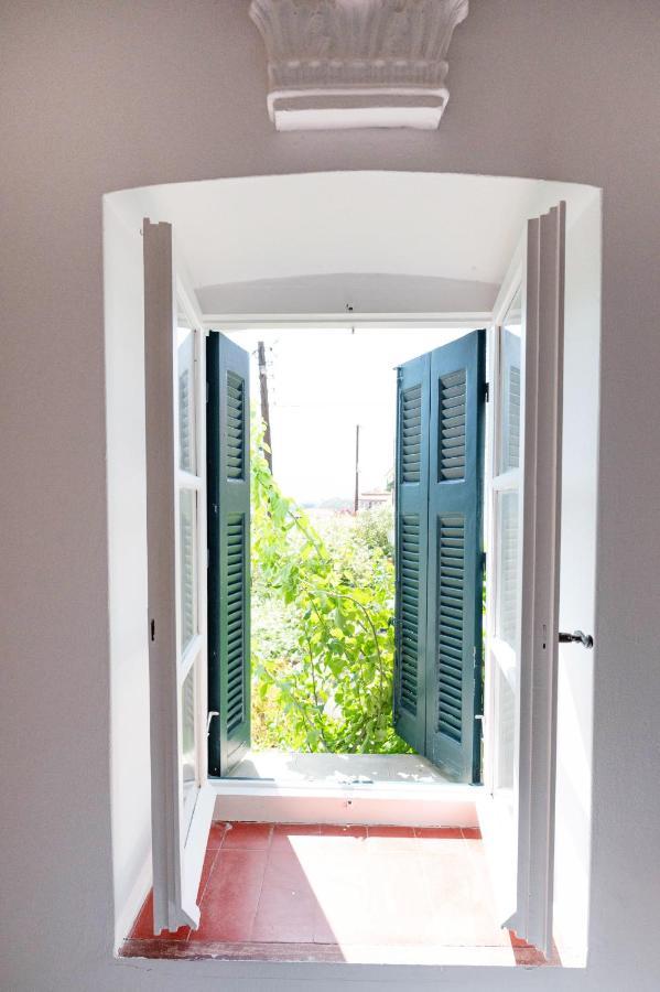 Traditional House Under The Clock Tower With Sweet View Poros Town Exterior photo