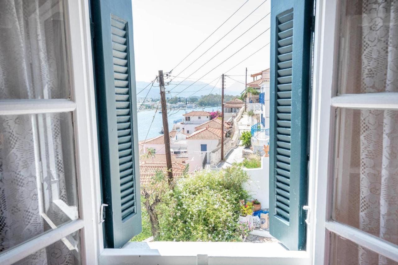 Traditional House Under The Clock Tower With Sweet View Poros Town Exterior photo
